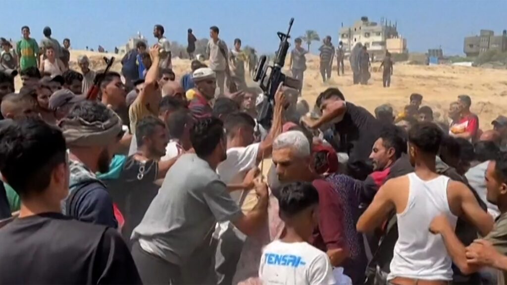 Gunfire at site of aid drop as hungry Palestinians scramble for food