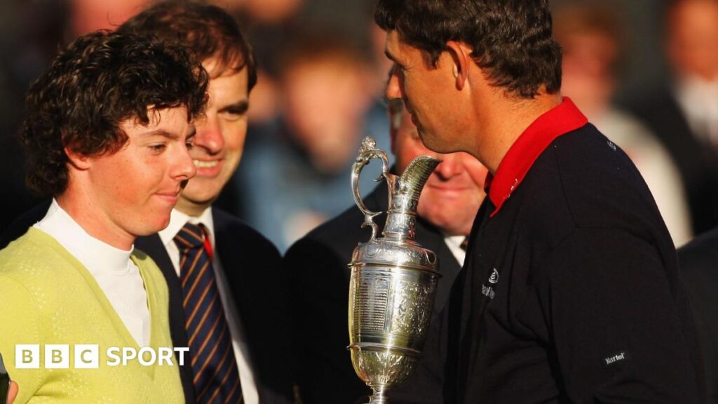 Padraig Harrington shakes hands with Sergio Garcia after beating him to the 2007 Open Championship title, while holding the Claret Jug and Rory McIlroy looks on