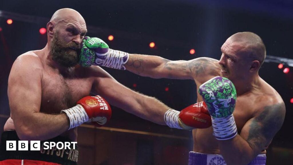 Tyson Fury being jabbed by Oleksandr Usyk