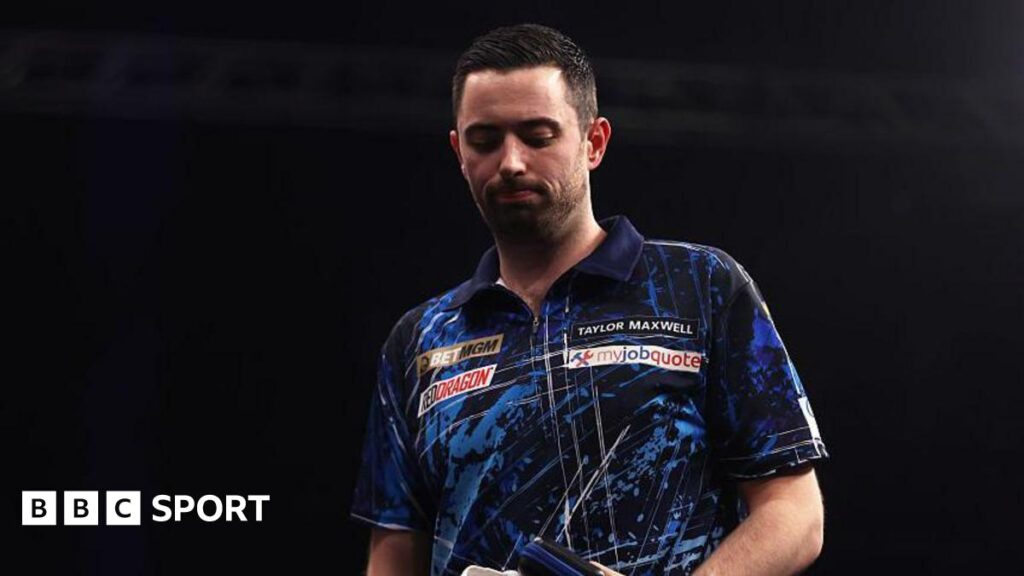 Darts player Luke Humphries looks dejected