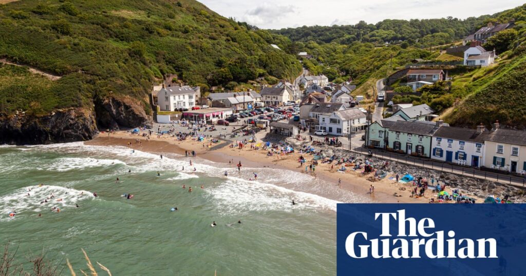 ‘Dizzying coastal paths, quiet beaches and dolphins’: readers’ highlights of the UK coastline | United Kingdom holidays