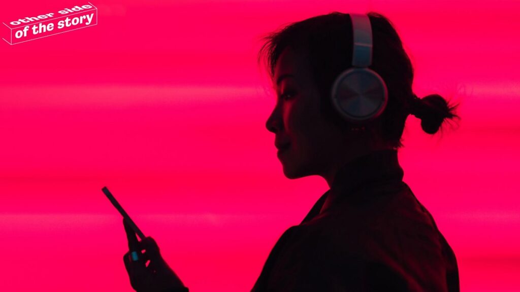 Image of a woman reading a book in a comfortable chair while wearing wireless headphones. The image also contains examples of TikTok posts expressing concerns about the health risks of the headphones