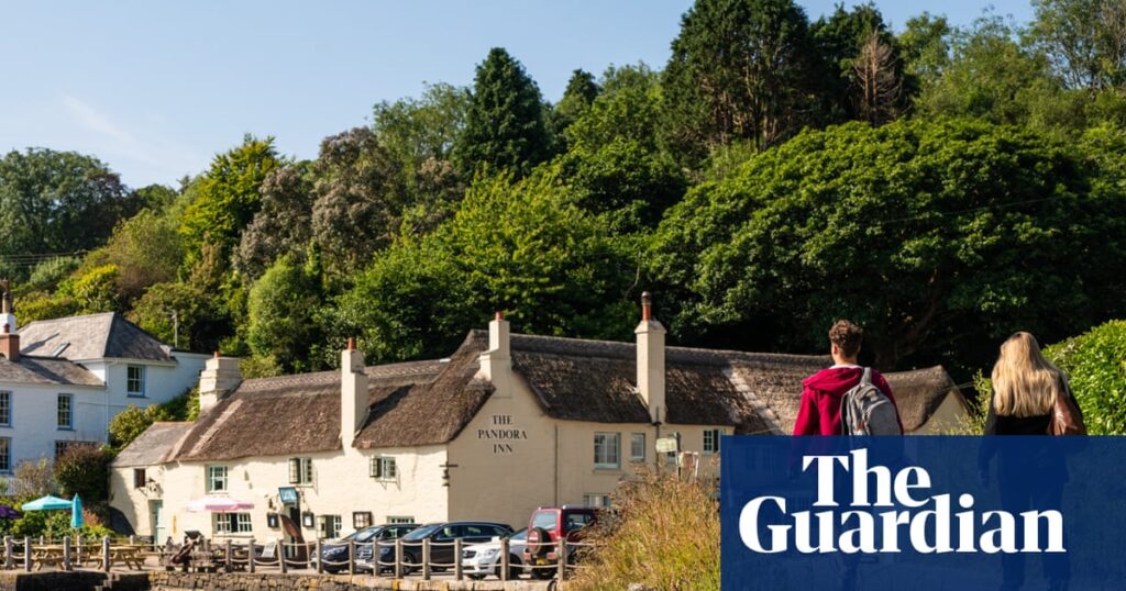 ‘Sipping a pint while trout splashed in the river on a perfect summer’s day’: readers’ favourite UK waterside pubs | Travel